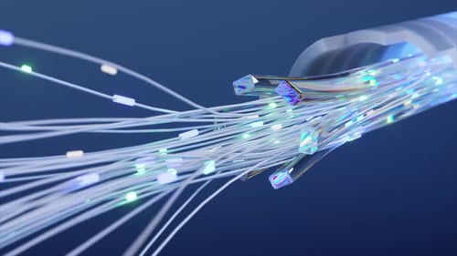 Close-up of the inside of a fiber optic cable with multiple colorful light beams